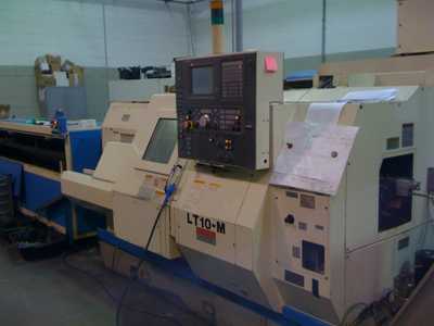 Tornio a controllo numerico OKUMA LT10-M